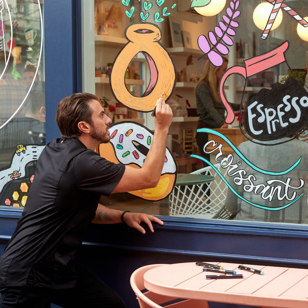 Window graphics with Sharpie brush tipped graphic markers