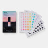 Pantone color swatch book with a colorful cover on a white background